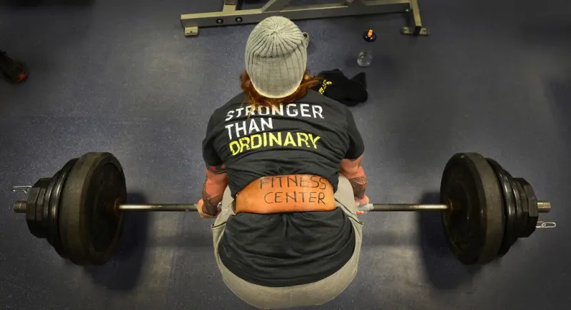 Barbell squat on the platform