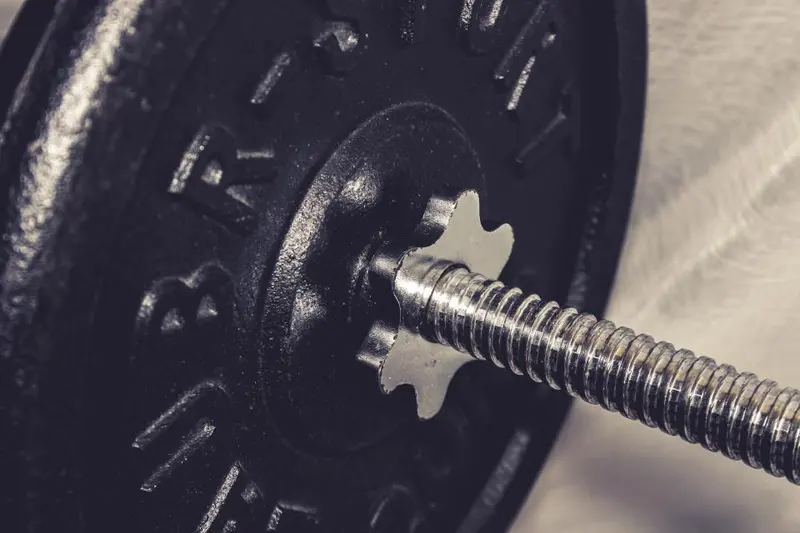 Loaded barbell on the floor