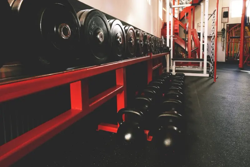 Dumbbell racks on the gym floor